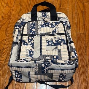 LeSportsac 4 piece nylon baby bag, blue floral print with pacifier pouch